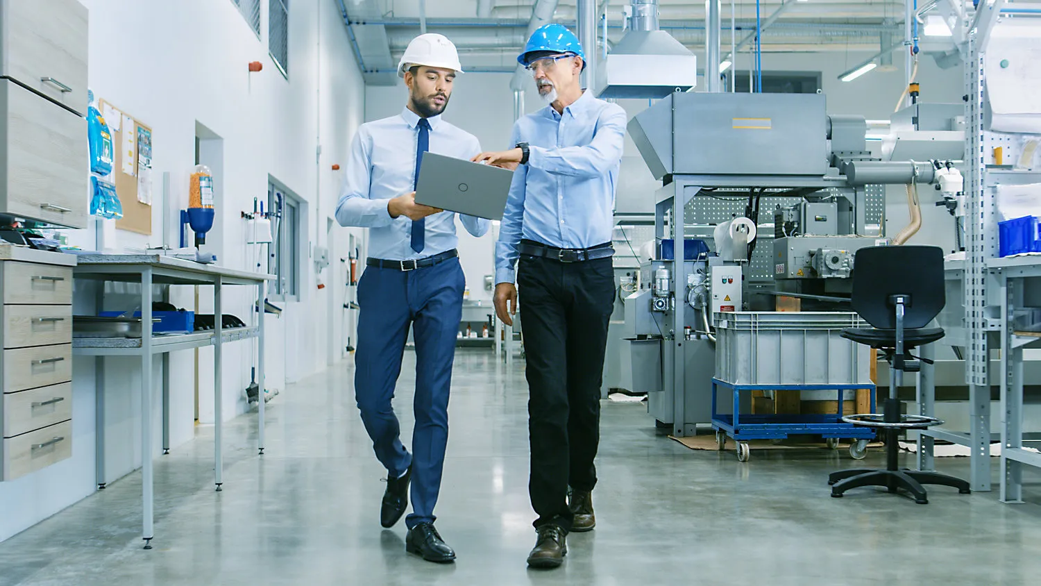 Gerrard Group team inspecting industrial machinery in a factory